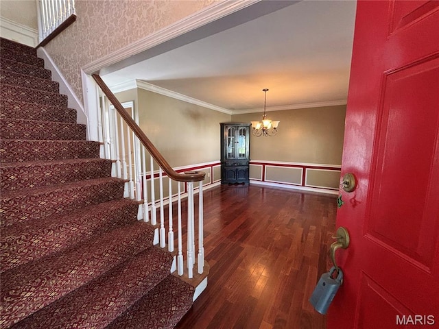 958 Kinsale Dr, Manchester, MO 63021 - foyer with wood finished floors, stairway, crown molding, a chandelier, and wainscoting