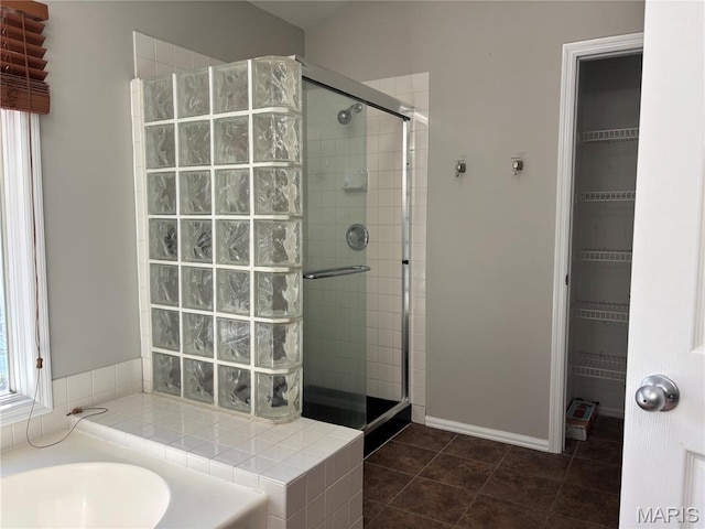 958 Kinsale Dr, Manchester, MO 63021 - bathroom with a shower stall, tile patterned flooring, and a spacious closet