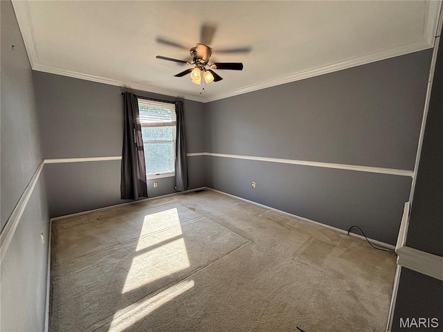 958 Kinsale Dr, Manchester, MO 63021 - spare room featuring crown molding, ceiling fan, and carpet floors