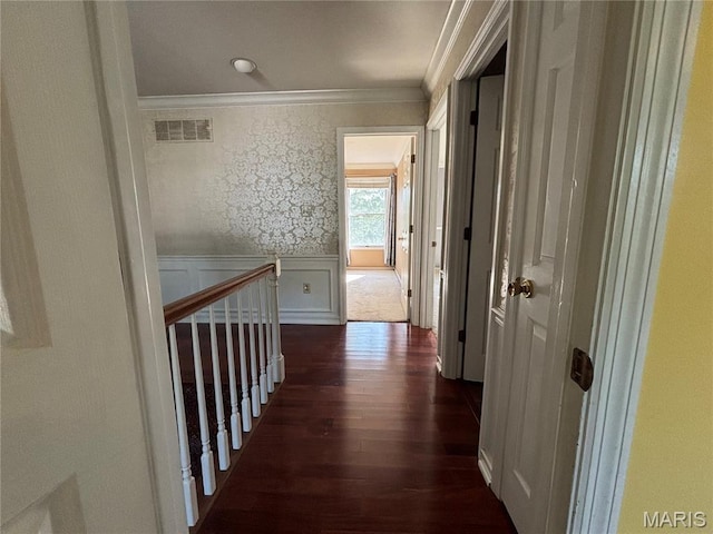 958 Kinsale Dr, Manchester, MO 63021 - hall featuring ornamental molding, dark wood-type flooring, an upstairs landing, and a wainscoted wall