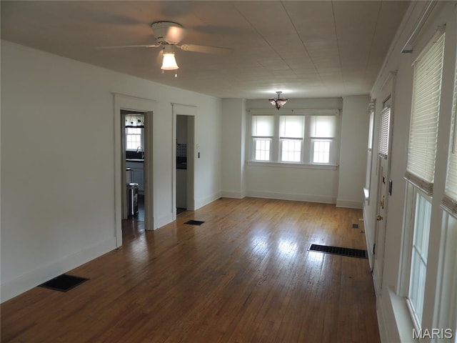 1203 E Jackson St, Mexico, MO 65265 - empty room featuring hardwood / wood-style floors and ceiling fan