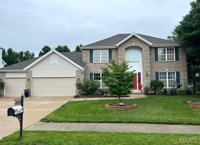 2235 Arnold Palmer Dr, Belleville, IL 62220 - colonial house with brick siding, driveway, and an attached garage