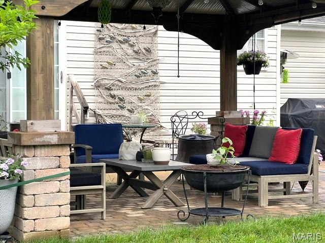 2235 Arnold Palmer Dr, Belleville, IL 62220 - view of patio featuring a gazebo and grilling area