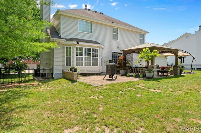 2235 Arnold Palmer Dr, Belleville, IL 62220 - back of property with a gazebo, a patio area, and a chimney