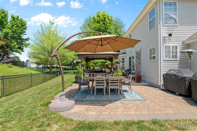 2235 Arnold Palmer Dr, Belleville, IL 62220 - fenced backyard featuring grilling area, a gazebo, a patio, and outdoor dining area