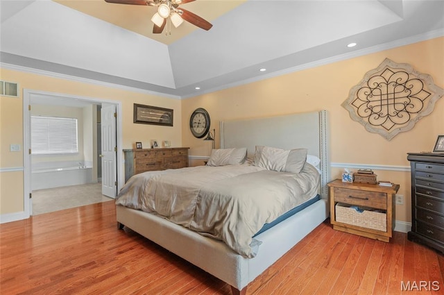 2235 Arnold Palmer Dr, Belleville, IL 62220 - bedroom with a tray ceiling, ornamental molding, light wood-type flooring, recessed lighting, and a ceiling fan