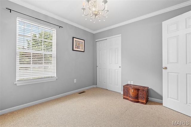 2235 Arnold Palmer Dr, Belleville, IL 62220 - unfurnished bedroom with carpet flooring, a chandelier, a closet, and crown molding