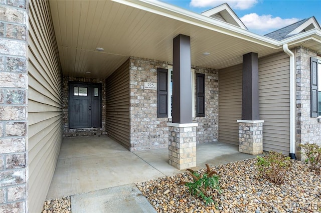 225 Ranchero Dr, Hamel, IL 62046 - property entrance featuring a porch