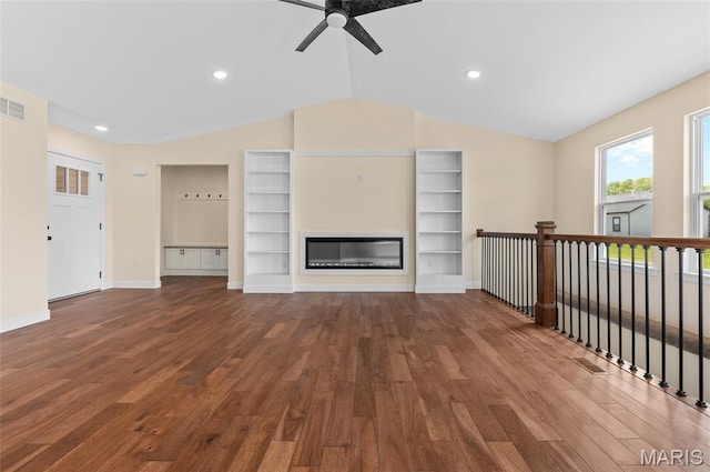 225 Ranchero Dr, Hamel, IL 62046 - unfurnished living room featuring lofted ceiling, wood finished floors, ceiling fan, a glass covered fireplace, and recessed lighting