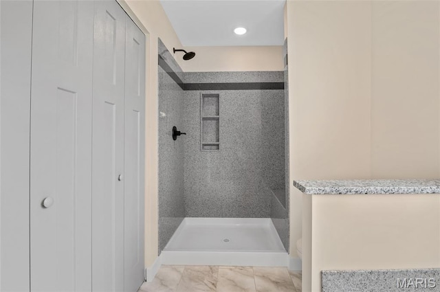 225 Ranchero Dr, Hamel, IL 62046 - full bath featuring a tile shower, marble finish flooring, a closet, and recessed lighting