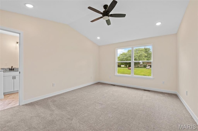 225 Ranchero Dr, Hamel, IL 62046 - empty room with light carpet, vaulted ceiling, a ceiling fan, and recessed lighting