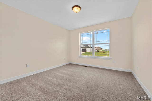 225 Ranchero Dr, Hamel, IL 62046 - carpeted spare room featuring baseboards