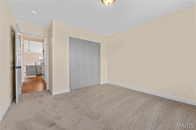 225 Ranchero Dr, Hamel, IL 62046 - unfurnished bedroom with carpet flooring and a closet