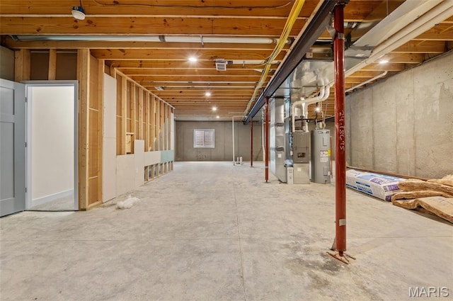 225 Ranchero Dr, Hamel, IL 62046 - unfinished below grade area featuring electric water heater and heating unit