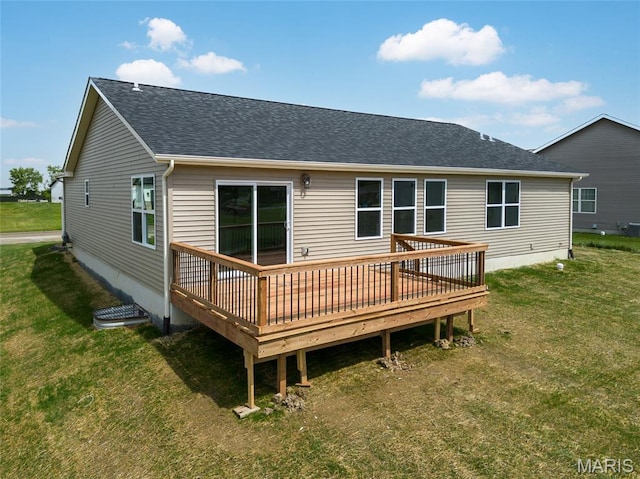 225 Ranchero Dr, Hamel, IL 62046 - back of property with a wooden deck, roof with shingles, and a yard