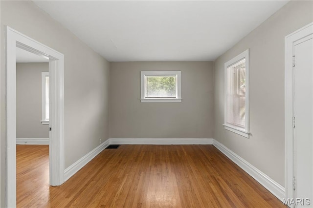3800 Oakridge Blvd, Northwoods, MO 63121 - spare room with wood finished floors and baseboards