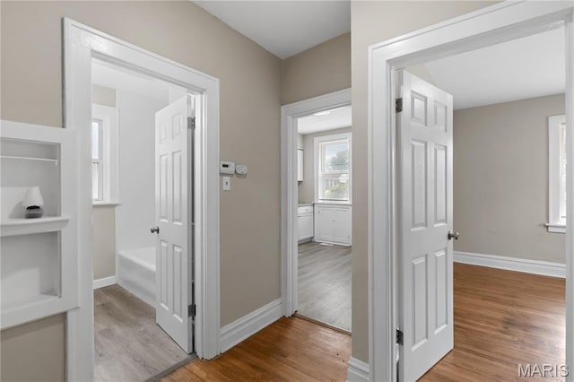 3800 Oakridge Blvd, Northwoods, MO 63121 - hall featuring wood finished floors and built in features