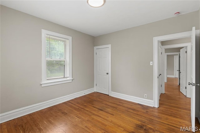 3800 Oakridge Blvd, Northwoods, MO 63121 - unfurnished bedroom featuring wood finished floors and a closet