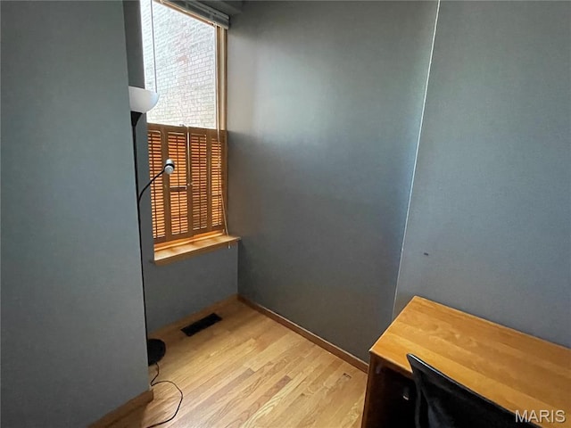 2319 Hickory St Unit A, Saint Louis, MO 63104 - spare room with wood finished floors