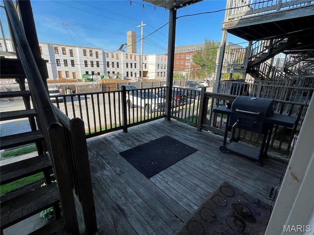 2319 Hickory St Unit A, Saint Louis, MO 63104 - wooden terrace featuring area for grilling and stairway