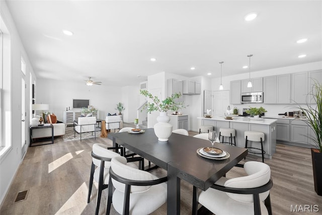 3059 Pirogue St, Saint Charles, MO 63301 - dining room with recessed lighting, light wood-style floors, and a ceiling fan
