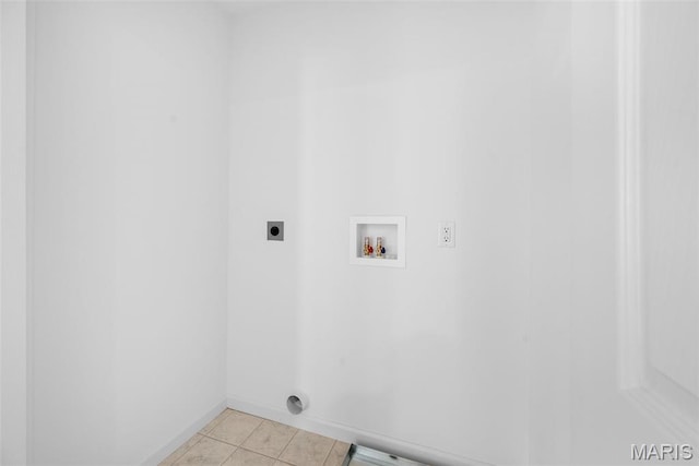 3059 Pirogue St, Saint Charles, MO 63301 - washroom featuring electric dryer hookup, washer hookup, and light tile patterned flooring