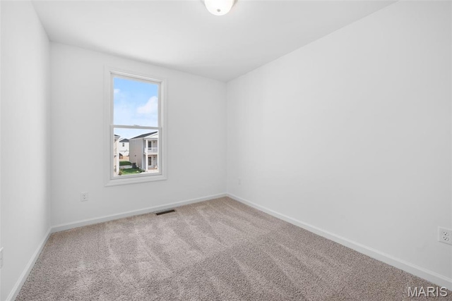 3059 Pirogue St, Saint Charles, MO 63301 - carpeted empty room featuring baseboards
