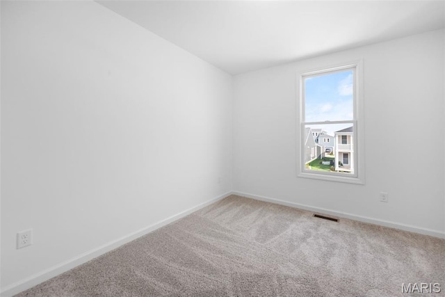 3059 Pirogue St, Saint Charles, MO 63301 - carpeted empty room featuring baseboards