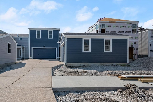 3059 Pirogue St, Saint Charles, MO 63301 - view of front facade with concrete driveway and a garage
