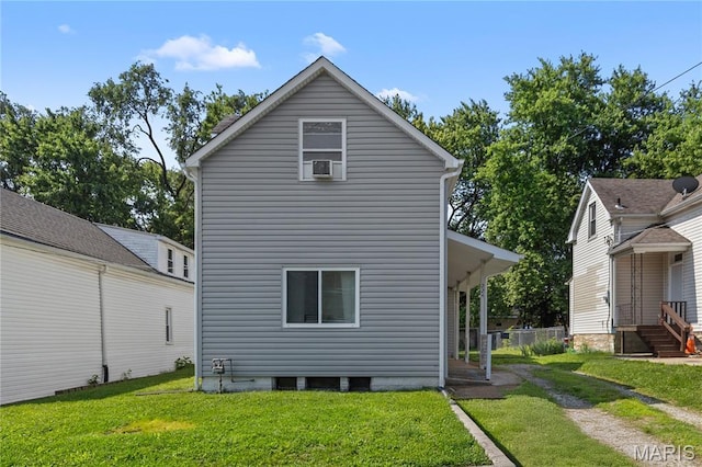224 E Velma Ave, Lemay Township, MO 63125 - back of house featuring a yard and cooling unit