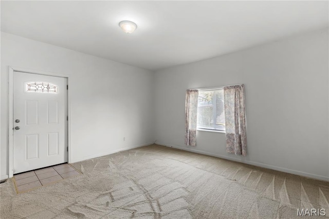 224 E Velma Ave, Lemay Township, MO 63125 - carpeted spare room featuring plenty of natural light and tile patterned floors