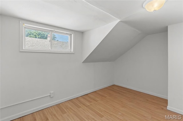 224 E Velma Ave, Lemay Township, MO 63125 - bonus room featuring wood finished floors and vaulted ceiling