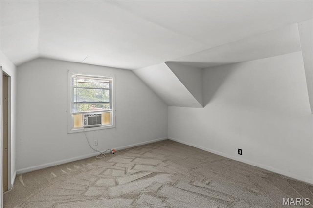 224 E Velma Ave, Lemay Township, MO 63125 - additional living space with vaulted ceiling, cooling unit, and carpet flooring