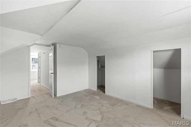 224 E Velma Ave, Lemay Township, MO 63125 - additional living space featuring carpet flooring and vaulted ceiling