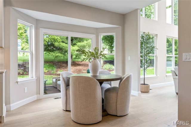 851 Whitmoor Dr, Weldon Spring, MO 63304 - dining space featuring plenty of natural light and light wood-style floors