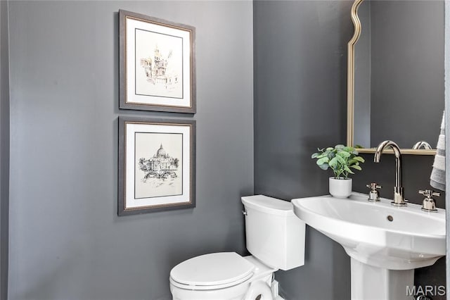851 Whitmoor Dr, Weldon Spring, MO 63304 - half bathroom with a sink and toilet