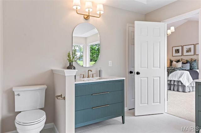 851 Whitmoor Dr, Weldon Spring, MO 63304 - bathroom with ensuite bathroom, vanity, a chandelier, and tile patterned flooring