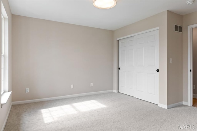 851 Whitmoor Dr, Weldon Spring, MO 63304 - unfurnished bedroom featuring carpet and a closet