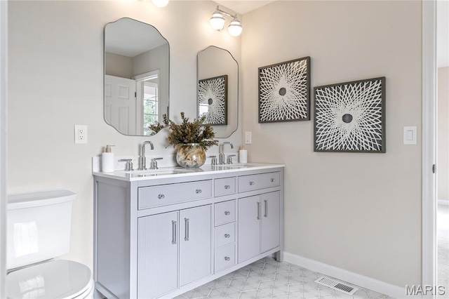 851 Whitmoor Dr, Weldon Spring, MO 63304 - bathroom with double vanity and baseboards