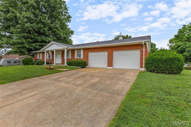 2844 Deborah Ann Dr, Arnold, MO 63010 - ranch-style home featuring a garage, concrete driveway, a front yard, and brick siding