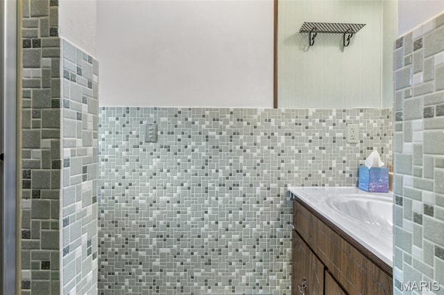 2844 Deborah Ann Dr, Arnold, MO 63010 - bathroom featuring tile walls, vanity, and wainscoting
