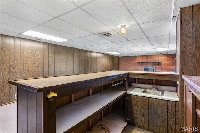 2844 Deborah Ann Dr, Arnold, MO 63010 - indoor wet bar with a drop ceiling and wooden walls