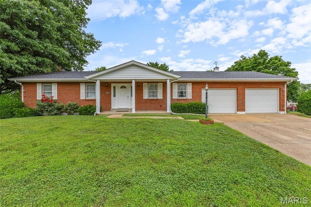 2844 Deborah Ann Dr, Arnold, MO 63010 - ranch-style house with a garage, concrete driveway, a front yard, and brick siding
