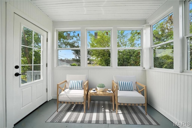 4550 Enright Ave, Saint Louis, MO 63108 - sunroom with finished concrete floors and healthy amount of natural light
