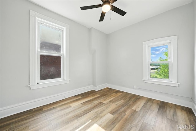 4550 Enright Ave, Saint Louis, MO 63108 - empty room with wood finished floors and a ceiling fan