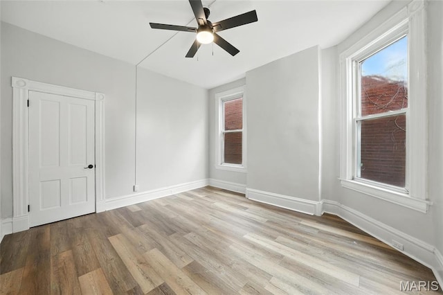 4550 Enright Ave, Saint Louis, MO 63108 - spare room with light wood-type flooring and a ceiling fan