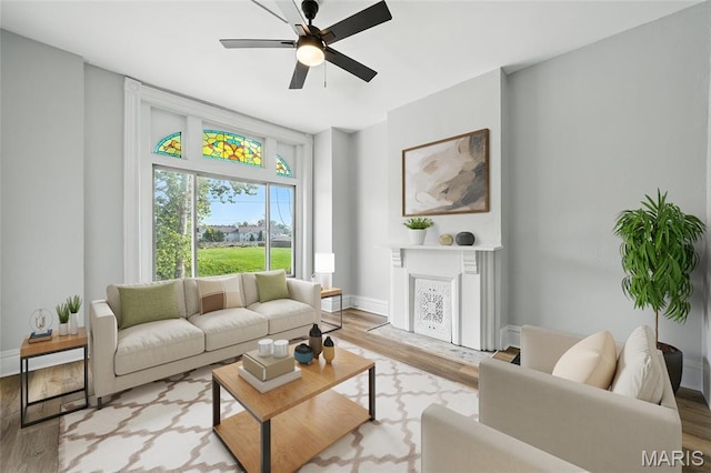 4550 Enright Ave, Saint Louis, MO 63108 - living room featuring wood finished floors and a ceiling fan