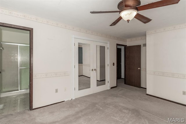 18 Novella Dr, Saint Peters, MO 63376 - unfurnished bedroom featuring french doors, carpet floors, and multiple closets