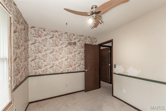 18 Novella Dr, Saint Peters, MO 63376 - empty room with wallpapered walls, ceiling fan, and carpet floors