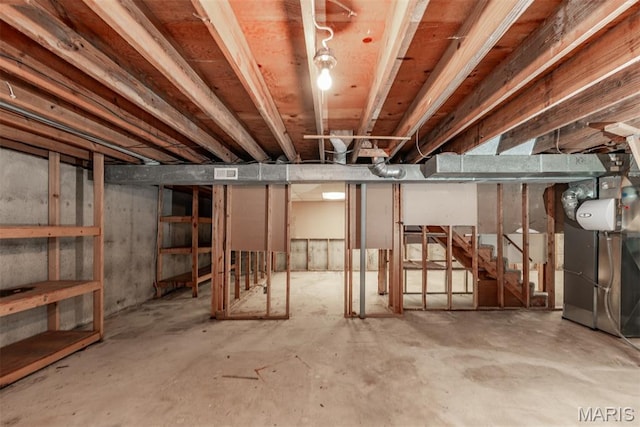 18 Novella Dr, Saint Peters, MO 63376 - unfinished below grade area with stairs and heating unit